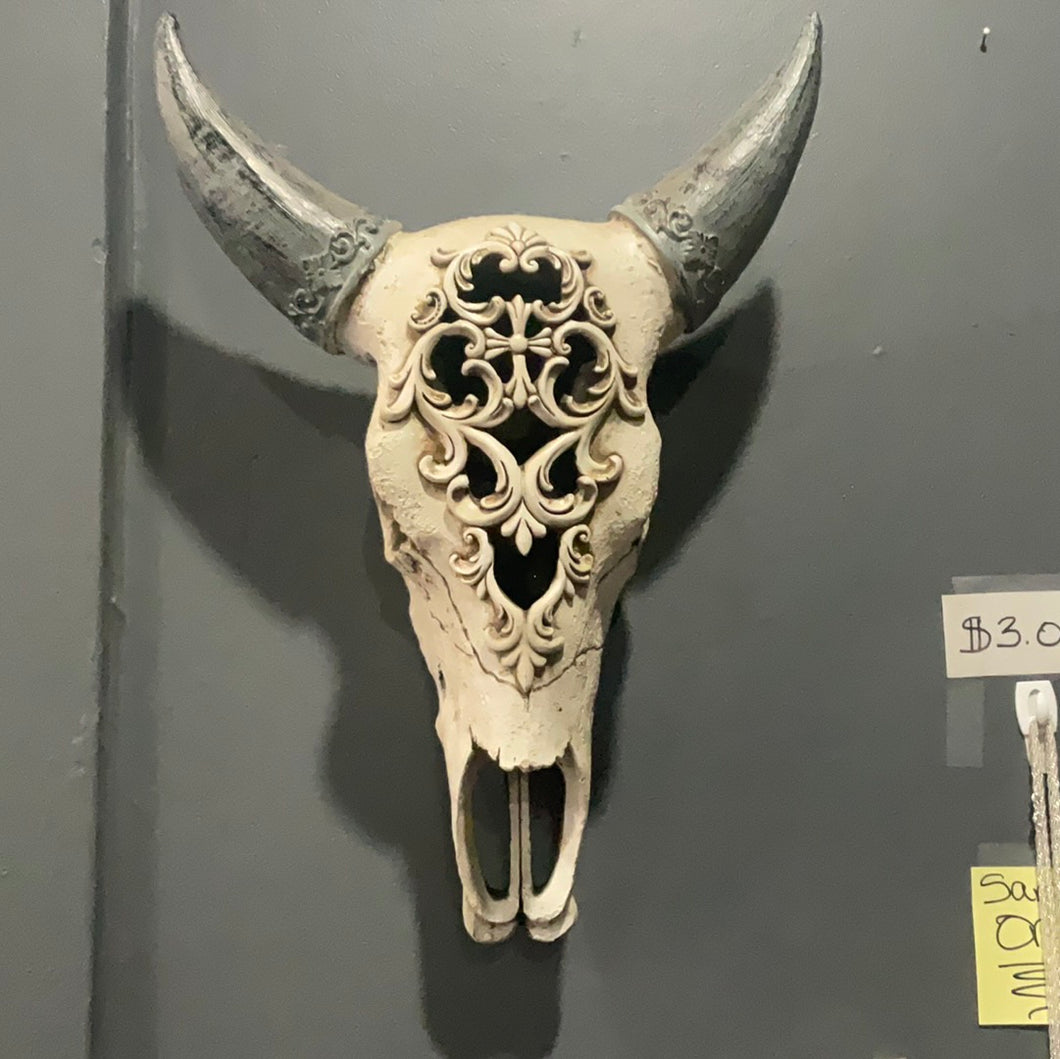 Carved resin bull skull